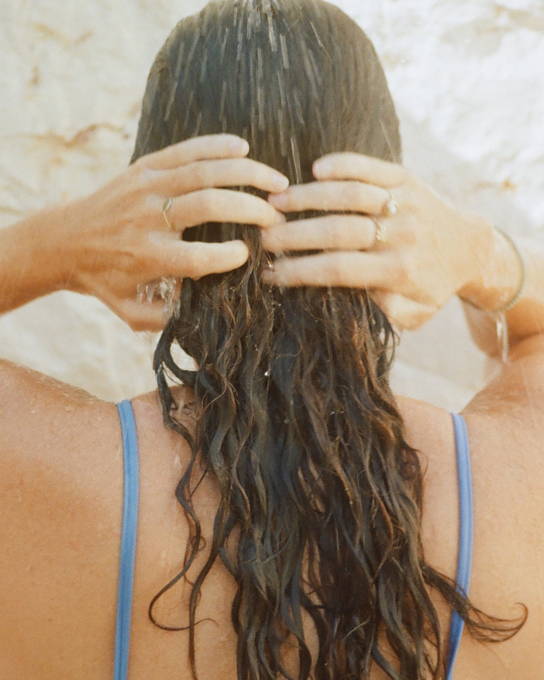 a person washing her hair