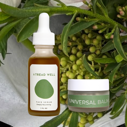 Tread Well skincare products with a dropper bottle and jar on a green leafy background
