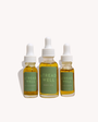 Three bottles of  & tread Well skincare products on a white background