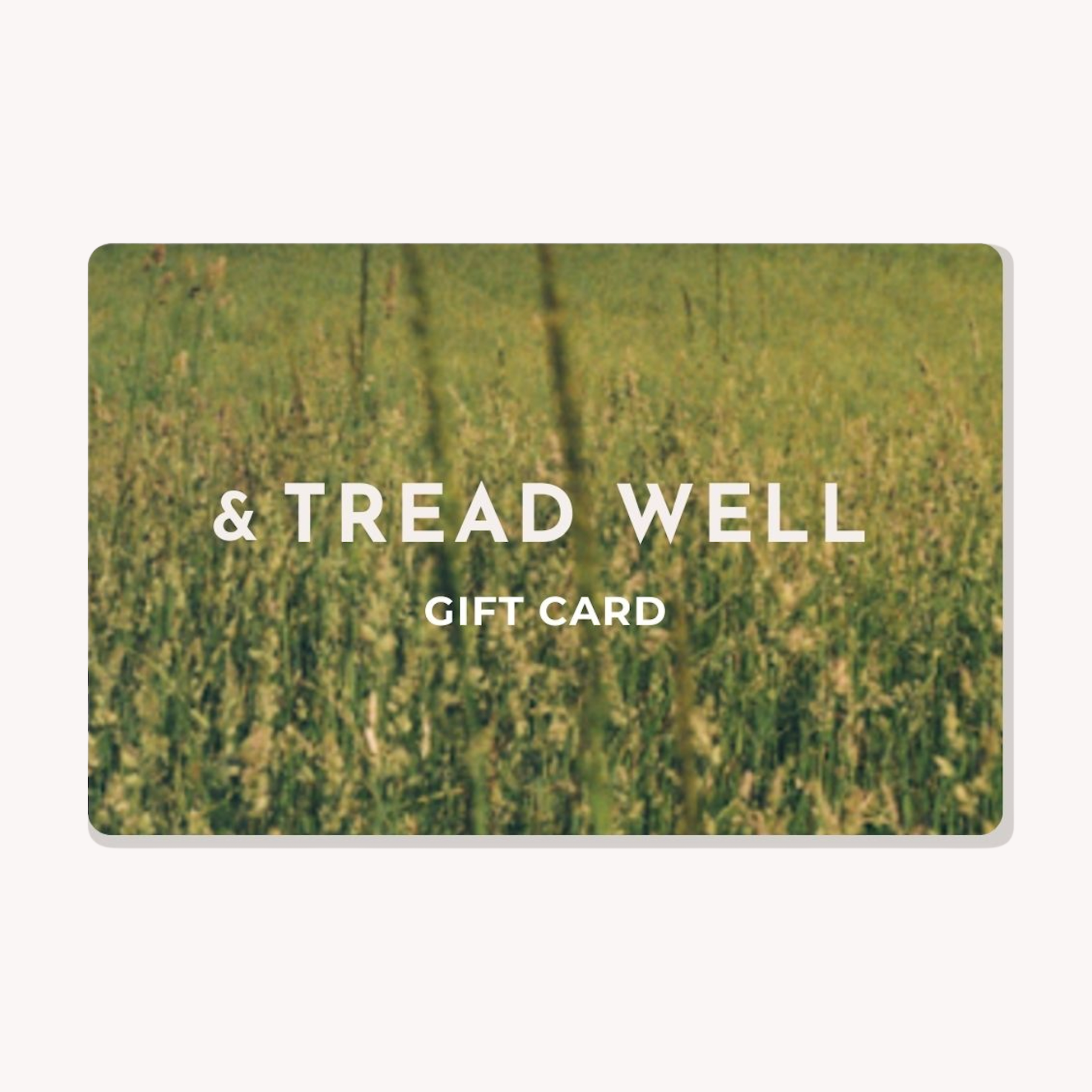 Gift card with 'Tread Well' branding on a green background
