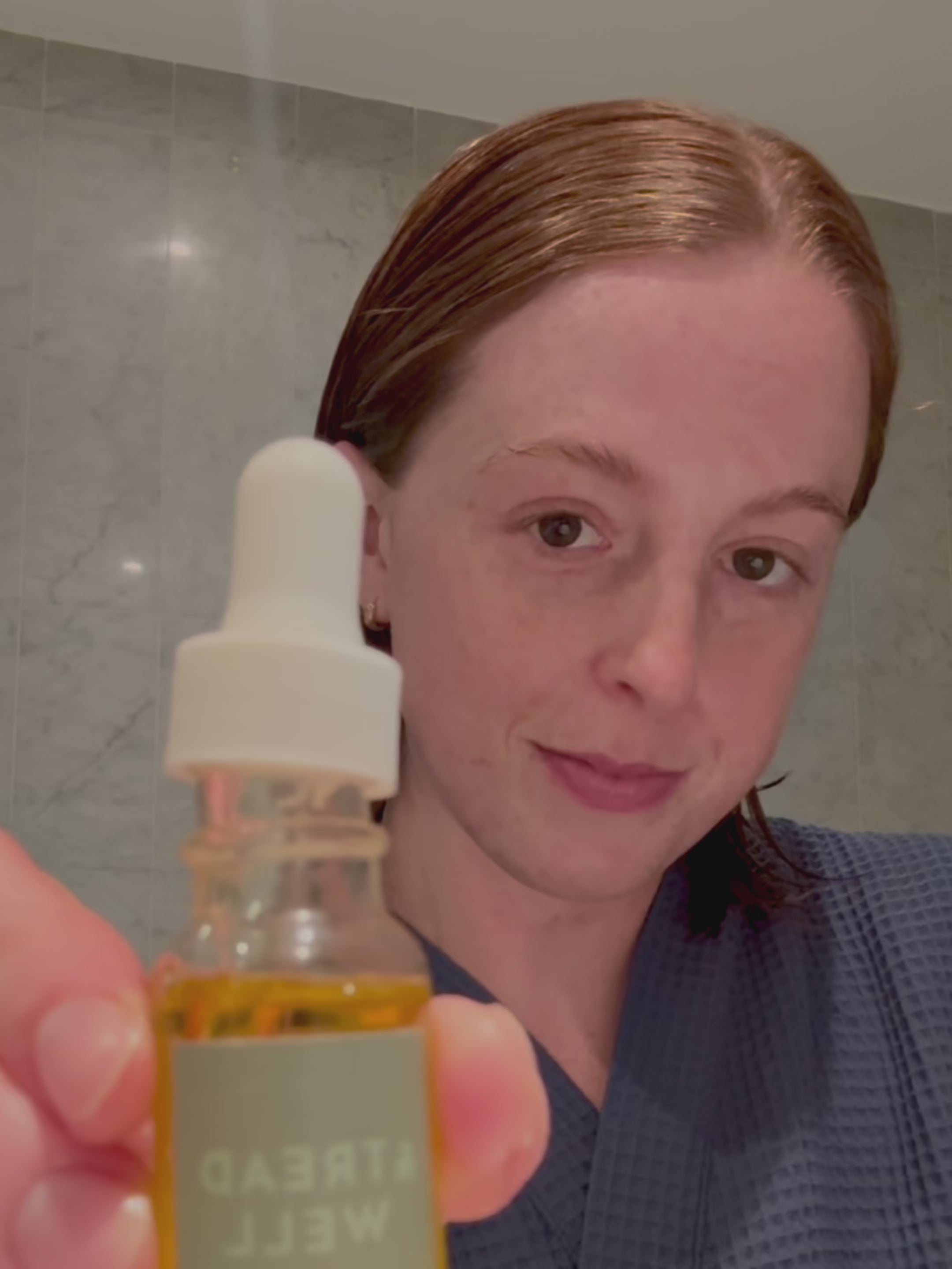 Oil Cleanser being applied with gua sha